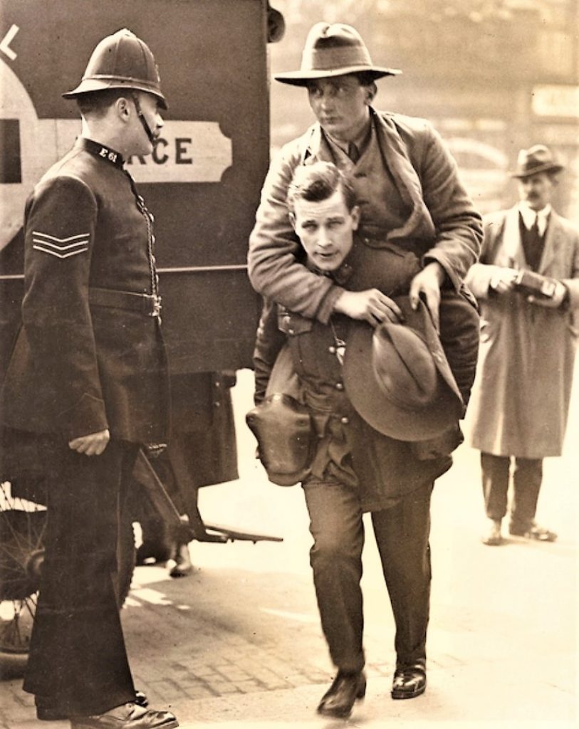 Australian wounded soldier being carried by a mate