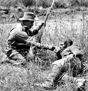 Australian Soldier Giving Drink To Wounded Turkish Soldier